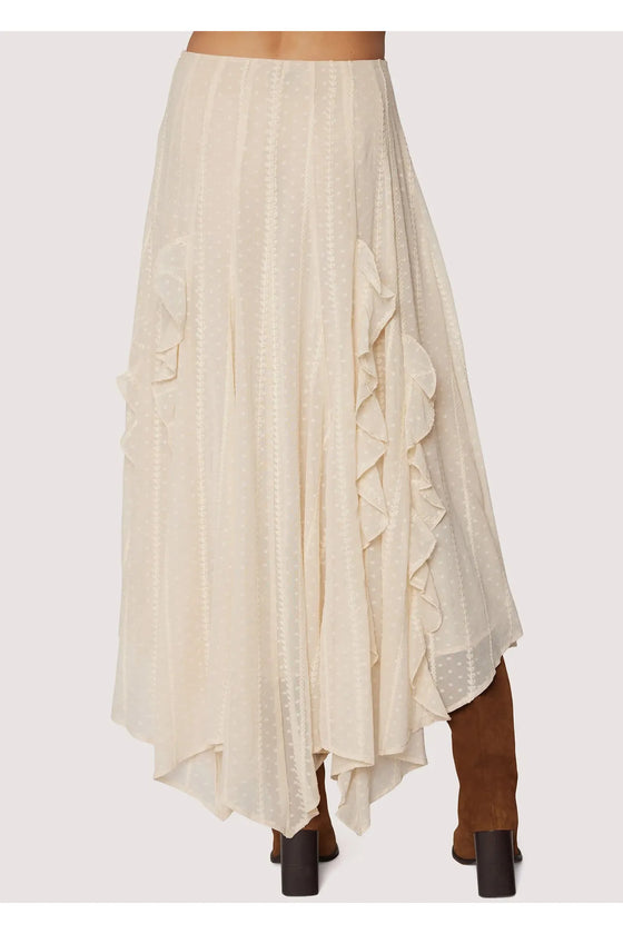White/Ivory ruffled skirt with brown boots on a white background