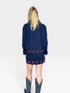 Jolie Grommet Denim Mini Skirt