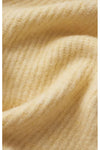 Close-up of yellow fabric texture
